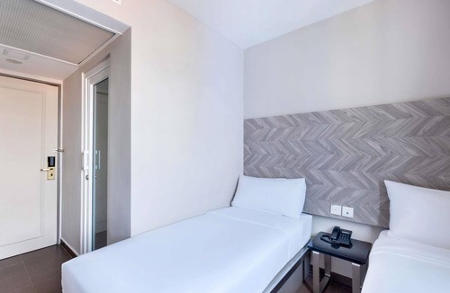Red Light District Hotel | ibis budget Singapore Dahlia