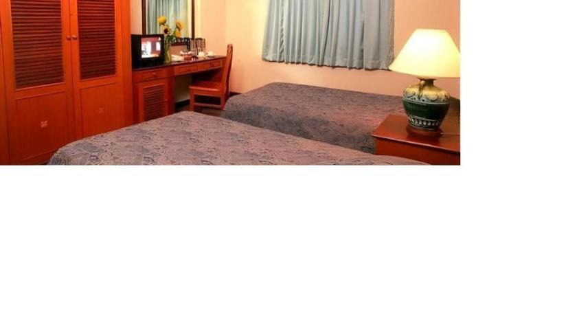 Photo of Bedroom in Bugis Village