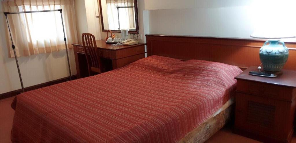 Photo of Bedroom in Bugis Village