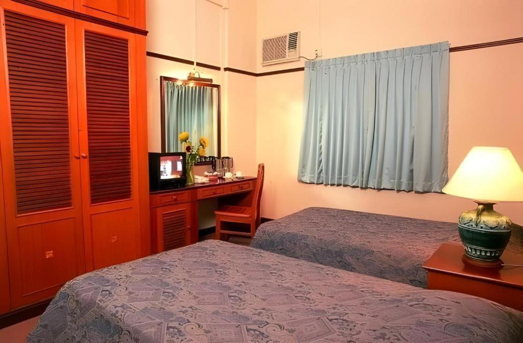 Photo of Bedroom in Bugis Village