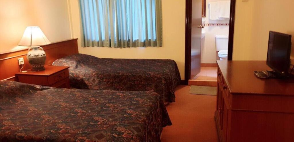Photo of Bedroom in Bugis Village