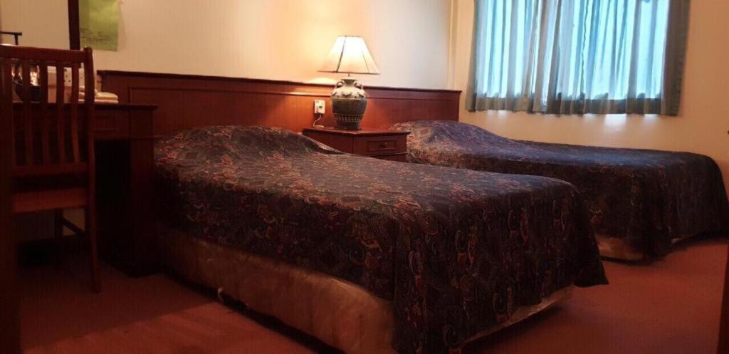 Photo of Bedroom in Bugis Village
