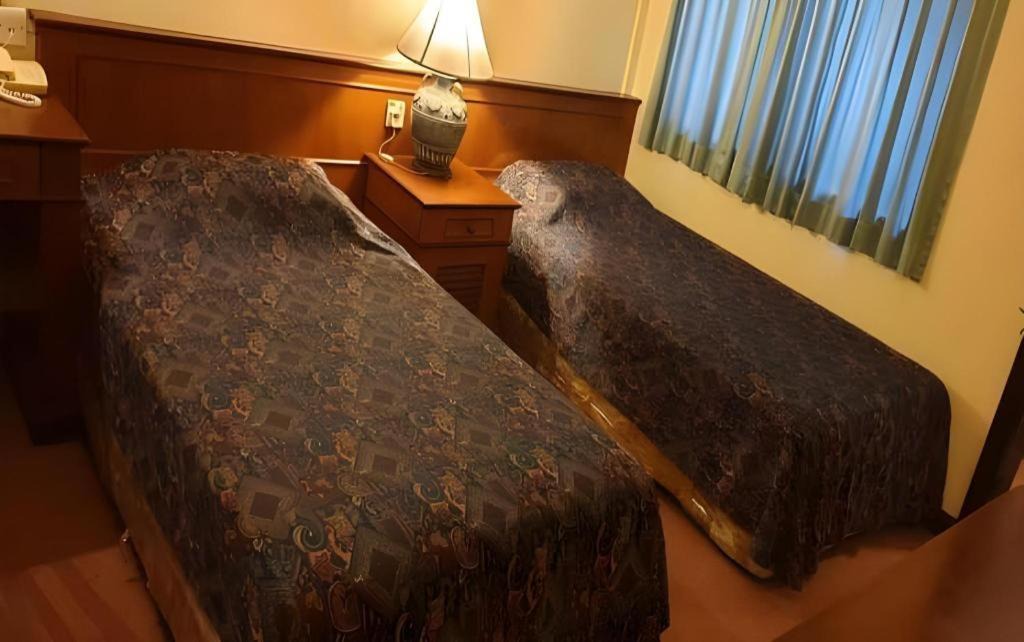Photo of Bedroom in Bugis Village