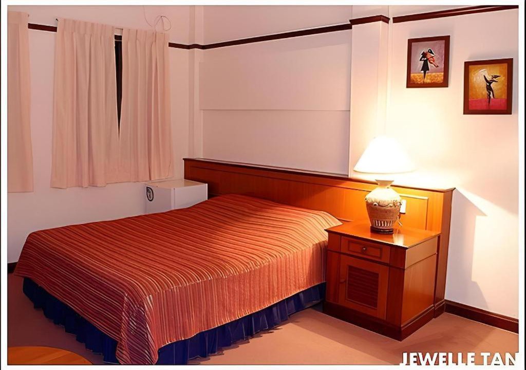 Photo of Bedroom in Bugis Village