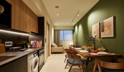 Four-Bedroom Apartment with Balcony 