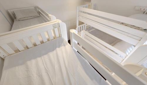 Bed in Triple-Deck 12-Bed Mixed Dorm